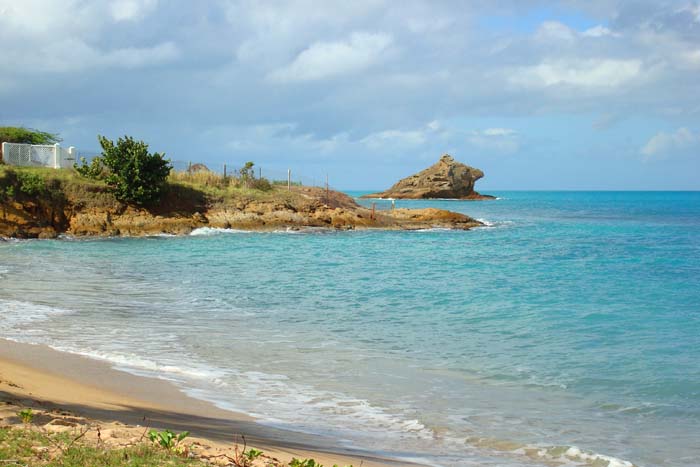 The white gate on the cliff leads to a nude bathing beach.
