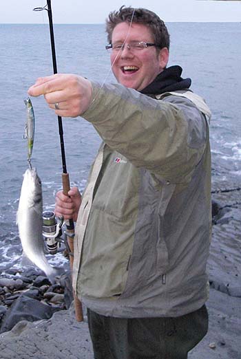 Ben with one of his tiny bass taken during our morning trip.
