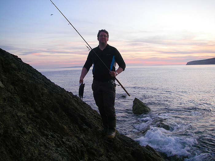 Ben, catch in hand, packs in well before the 'taking time'.