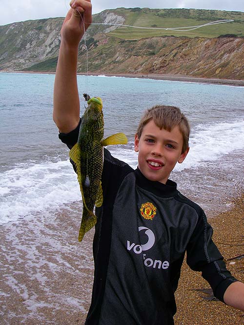 Finally a bunch of worms (the dregs) produced a couple of slightly bigger fish. Perhaps if we'd had a few hard crabs we might have caught some better fish. By now Ben was too warm and my old coat had been dumped.
