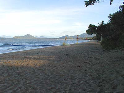 Note the warning flags. This small enclosure, on a beach north of Cairns, is to keep jellyfish out so that people can have a swim in the sea.