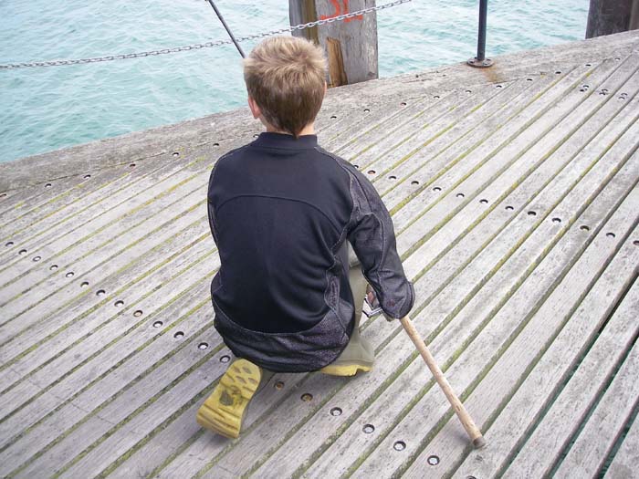 He's not wearing his coat yet. That came later when it rained.