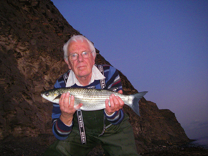 Every mullet takes a fair time to beach. This was my smallest of the session. Note the lack of jacket - it was calm and mild.