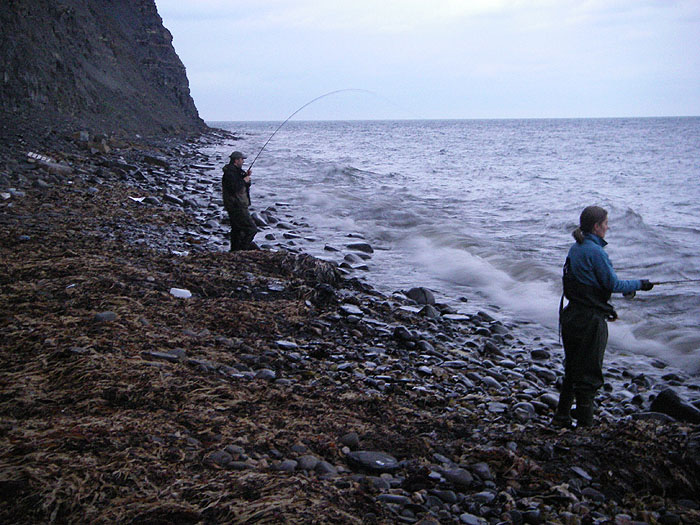 Charlie and Sara fishing, with Charlie into his first mullet.