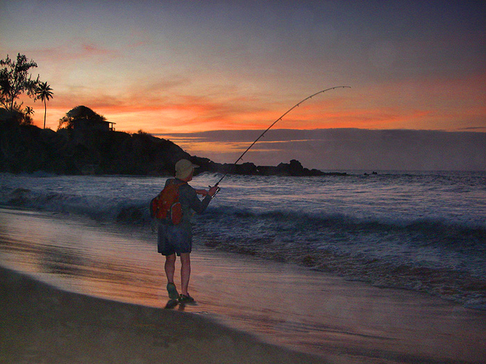 My first hit of the holiday - a nice barracuda has grabbed the popper and is racing about in the surf.