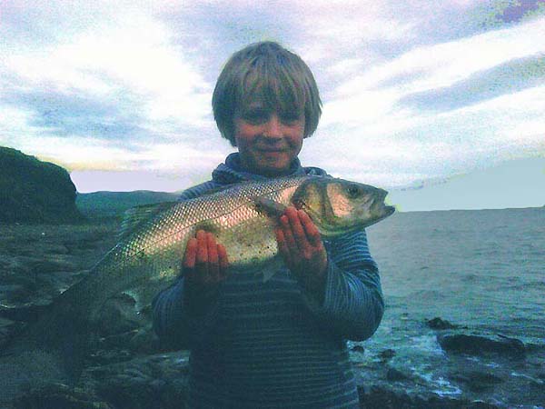 This is a real angler in the making. Picture by dad, taken on a mobile phone but you can still see how pleased he is.