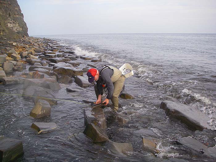 Nigel's mullet slides onto the boulders. The fuzzy patches on this picture and the previous one were due to an undiscovered mackerel scale on the lens.