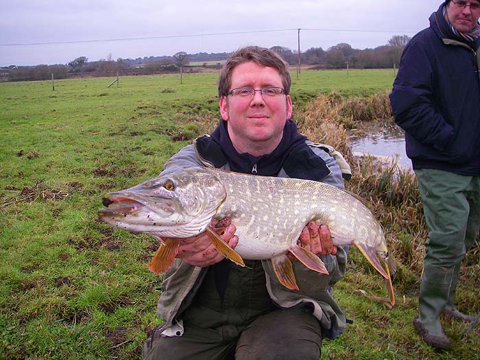 Phil looks on at Ben's pike - one of six that we had that afternoon. A nice way to start the year