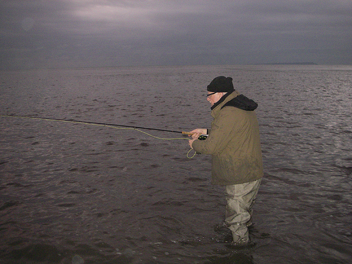 Nigel watches intently as his fly floats toward a surface-feeding mullet.