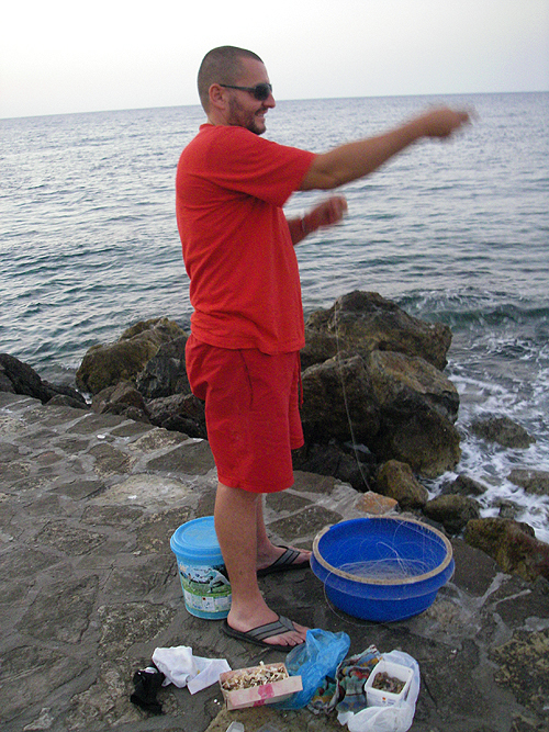 Note the line coiled in the basket and two boxes of bait.