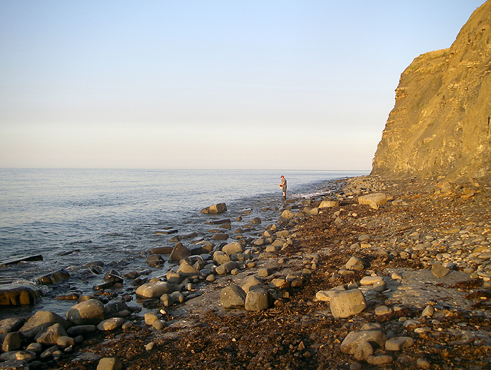 Flogging away for his catch of small bass.