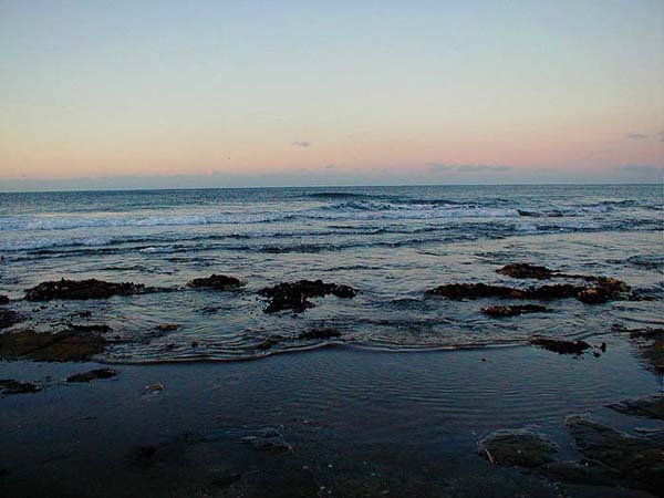 It's almost high water and there is very little surf over the ledge - easy fishing.