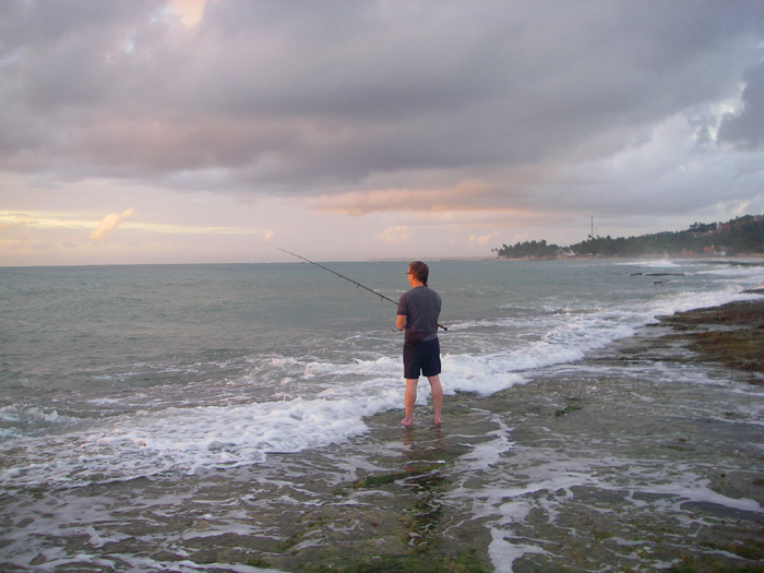 Rich fishing the rocks from which we caught the snook.