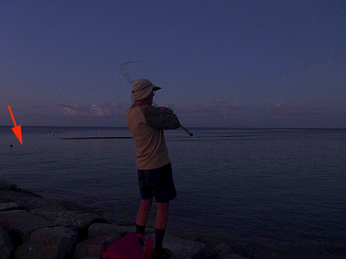 I hooked this just to the right of the buoy. The line screamed off and Steve only managed to get one picture before it smashed me on the rocks. Whewwwww!!!!!!!