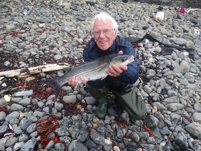 Bill took this picture before I put the fish back.