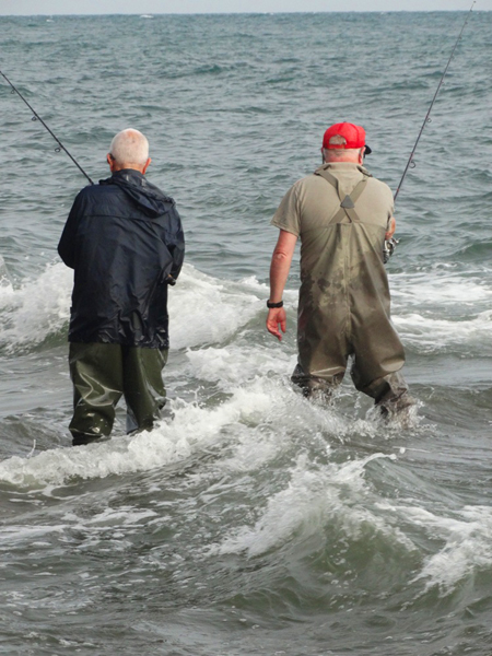 Bill took this picture of Nigel and me fishing at high water.