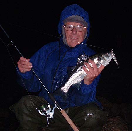 Steve took my picture with a bass.