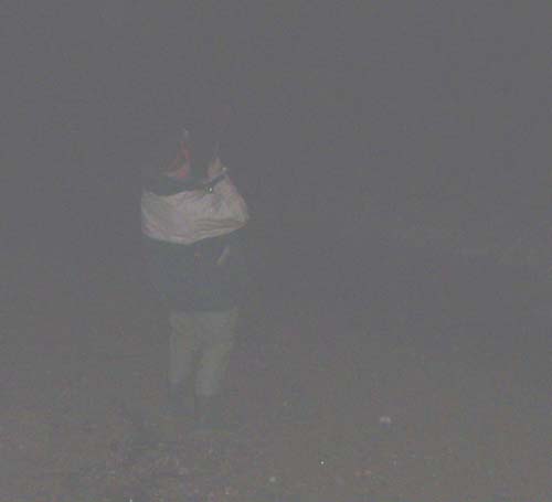 Nigel feels the weight and power of his first bass - somewhere out there in the gloom.