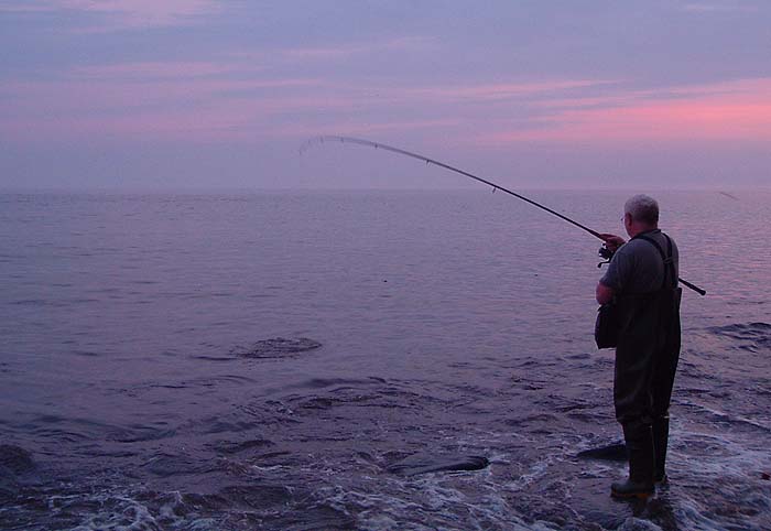 Not all the fish took flies and here Nigel plays a good bass on a taken on plug.