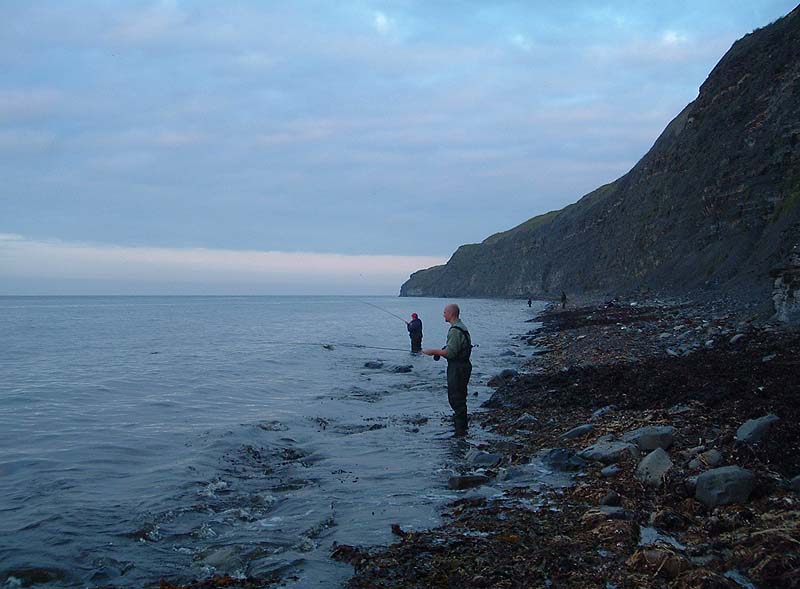 Nigel into a fish while Brian tries for another one - the anglers in the distance were fruitlessly legering baits