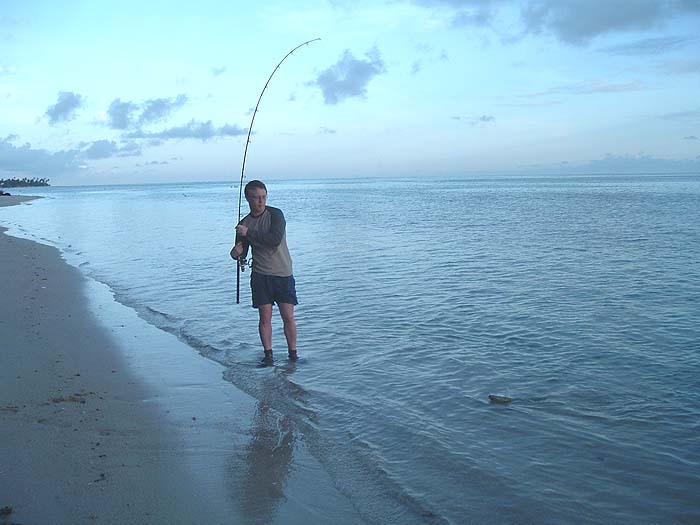 After a long hard battle Rich is about to beach a good bonefish.