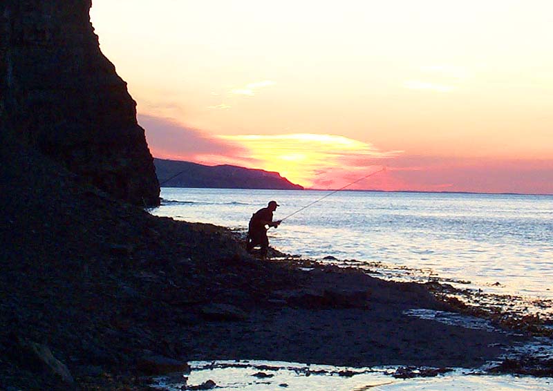Still trying for the mullet as darkness closes in.