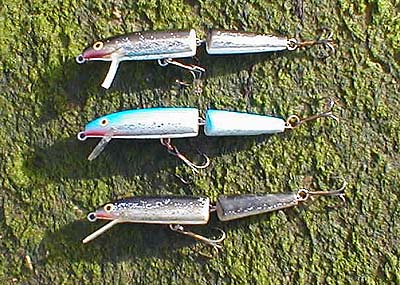 From the top, note the angles of the lips - super-shallow diver, normal J11F, deeper diving modification.