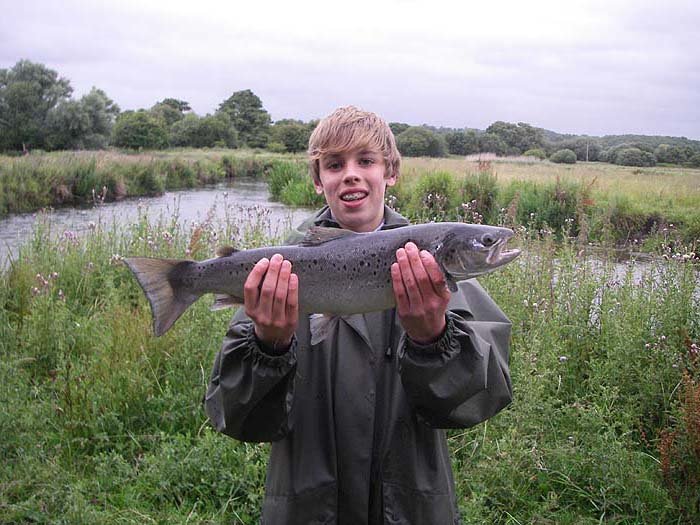 Young ben with a decent seatrout taken on a Rapala on a bright sunny evening.