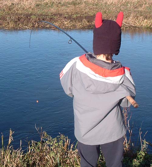 Ben's hat gives him a perky look as he leans into his first pike.