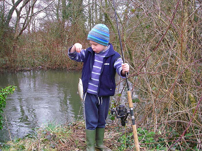 Young Reuben with is first ever fish.  That feeling probably stays with you for ever.