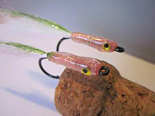 These could look like tiny squids or shrimps to the fish.