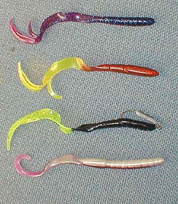 The floppy spiral tails give different action but can be just as effective as a fish attractor.  The third one down has a lead and a hook fitted in a 'weedless' fashion.