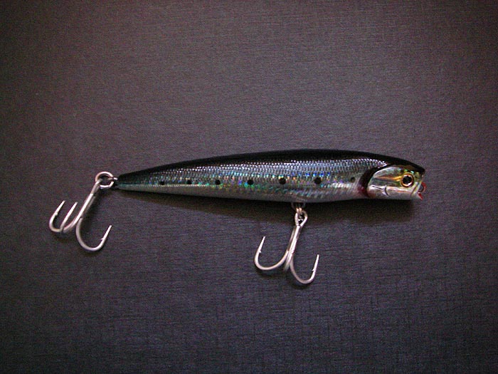 I presume that this represents a large injured baitfish after the impact of a bass strike.  A twitch and a bit of flavour probably help the deception.