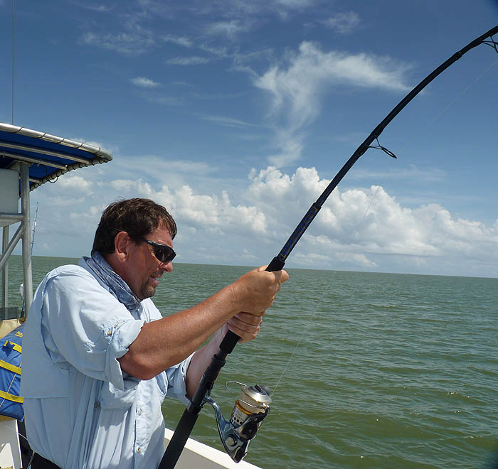 Steve struggles to bring a good fish under control.