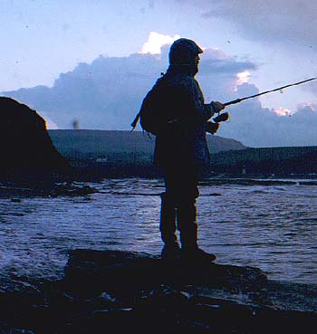 Spinning for bass on the Dorset coast.